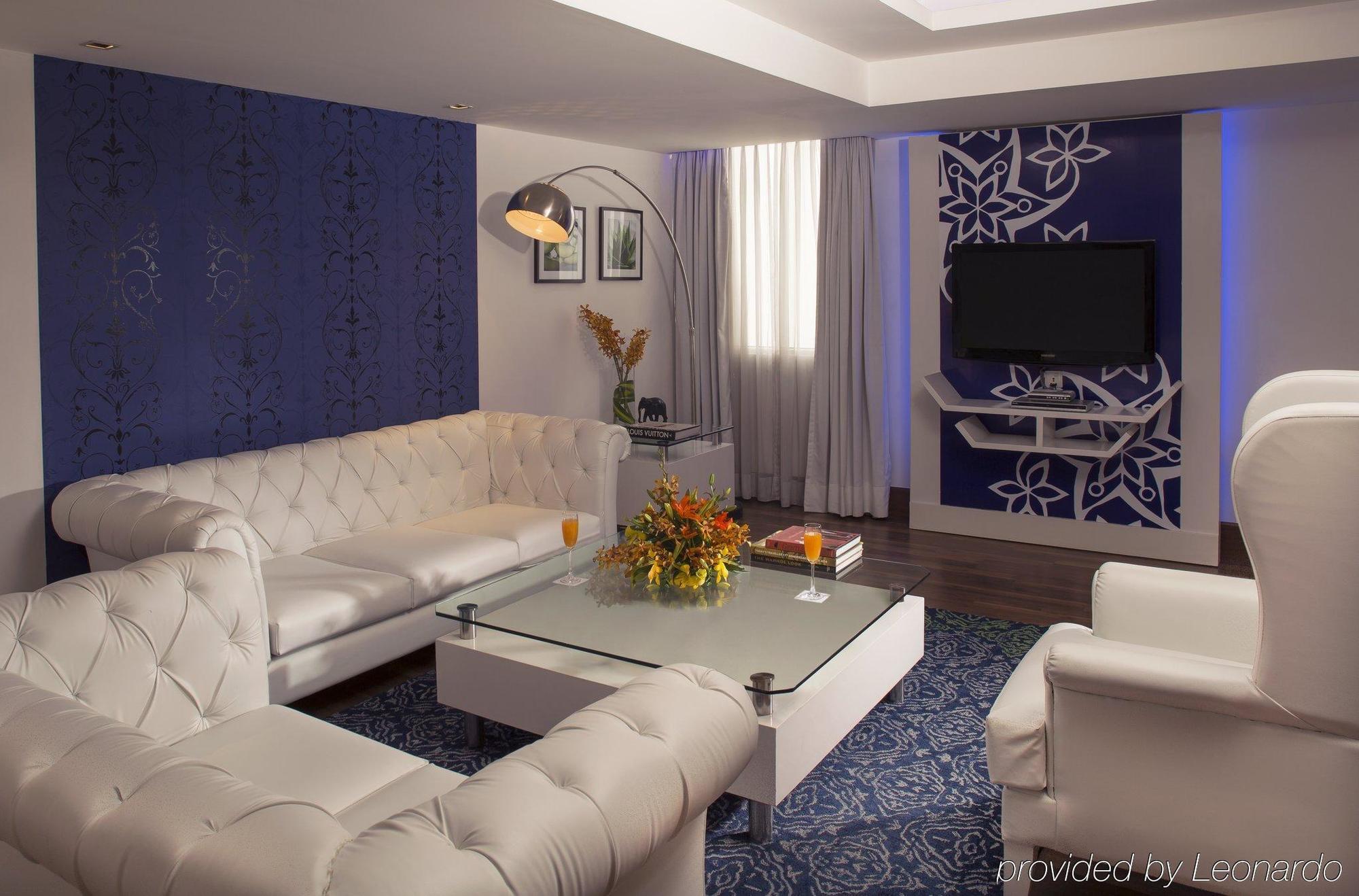 Radisson Blu Kochi Hotel Luaran gambar A 3D rendering of a living room